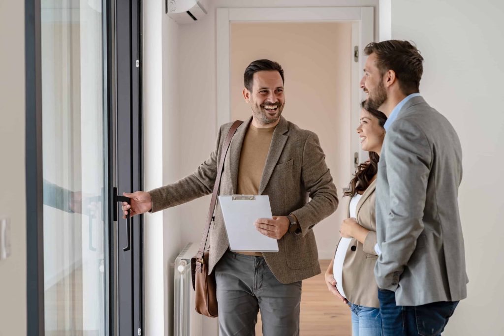 Real estate clients touring homes