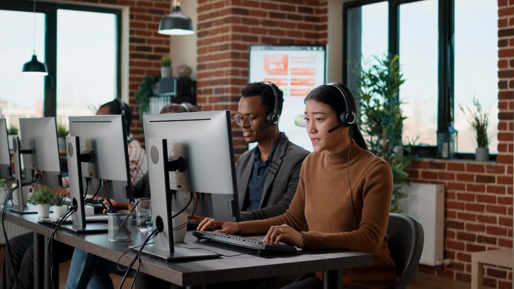 A team working together in an open-plan office