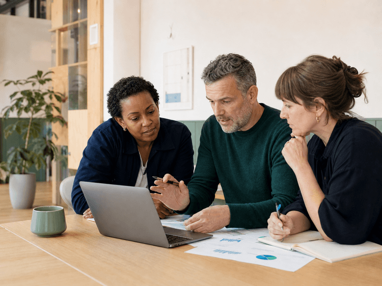 A business growth programme delivery team reviewing cohort progress