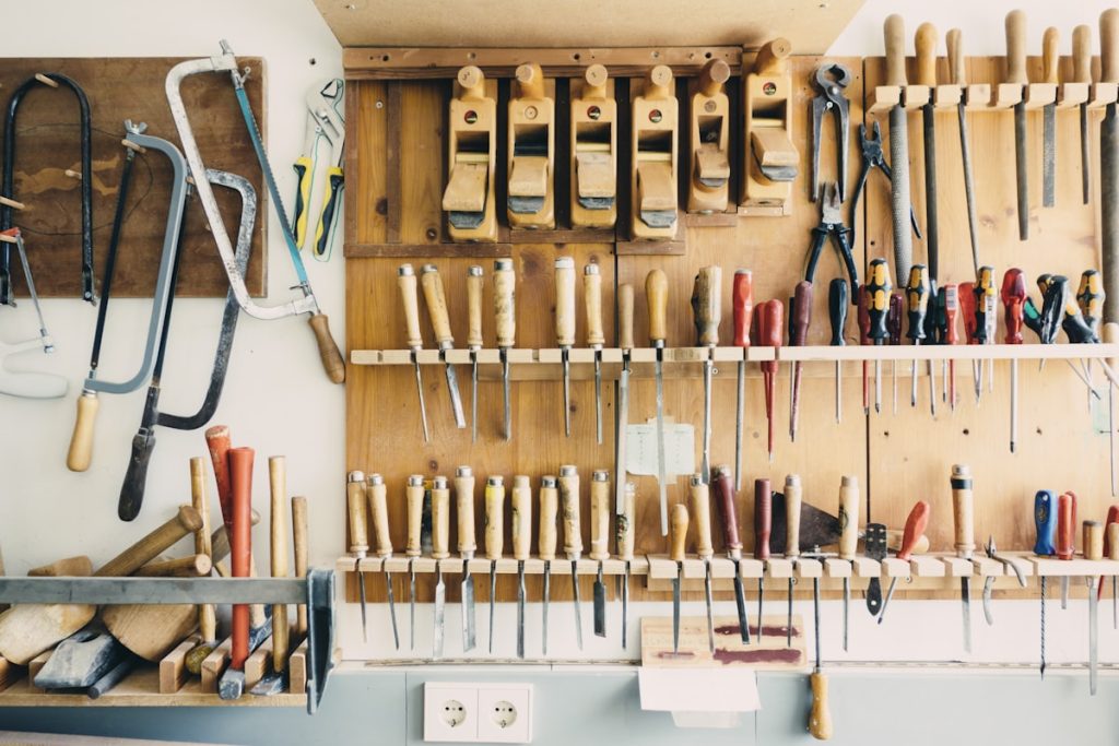 Phone camera framing a wall of tools