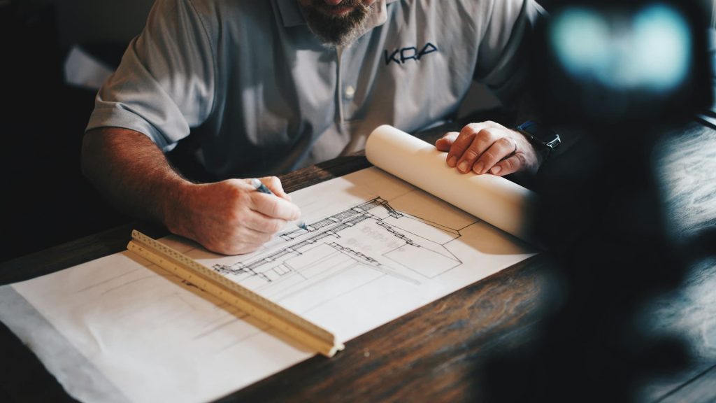 Drafting tools on a wooden workbench